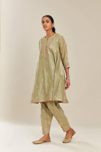 Sage green hand block printed short kalidar silk chanderi kurta set with button placket and all over gold gota and zari embroidery.
