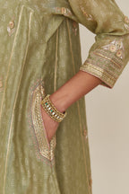 Sage green hand block printed short kalidar silk chanderi kurta set with button placket and all over gold gota and zari embroidery.