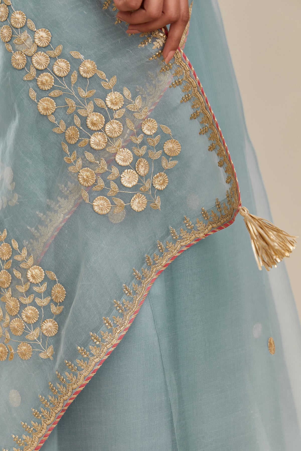 Blue silk organza saree with delicate gold gota and zari embroidery border. and blouse
