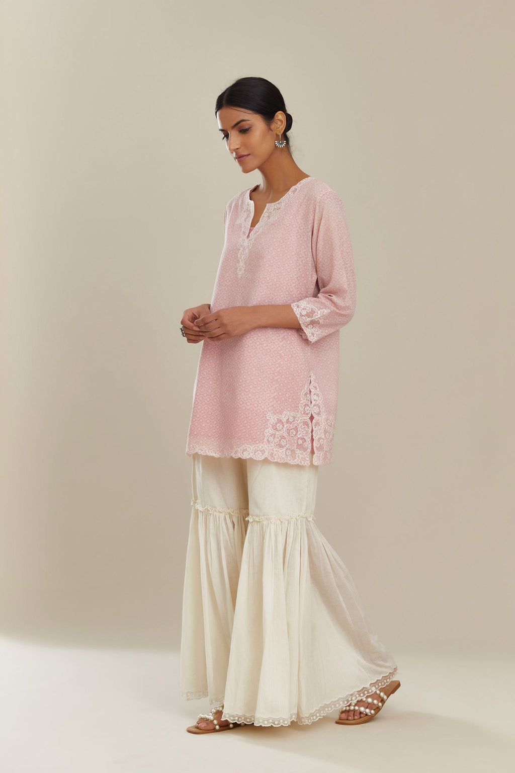 Pink hand block over-printed cotton straight short kurta set with embroidered cotton chanderi cutwork, highlighted with sequins.