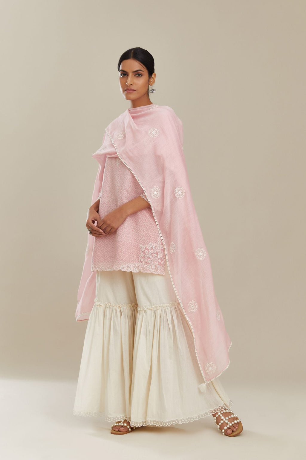 Pink hand block over-printed cotton straight short kurta set with embroidered cotton chanderi cutwork, highlighted with sequins.