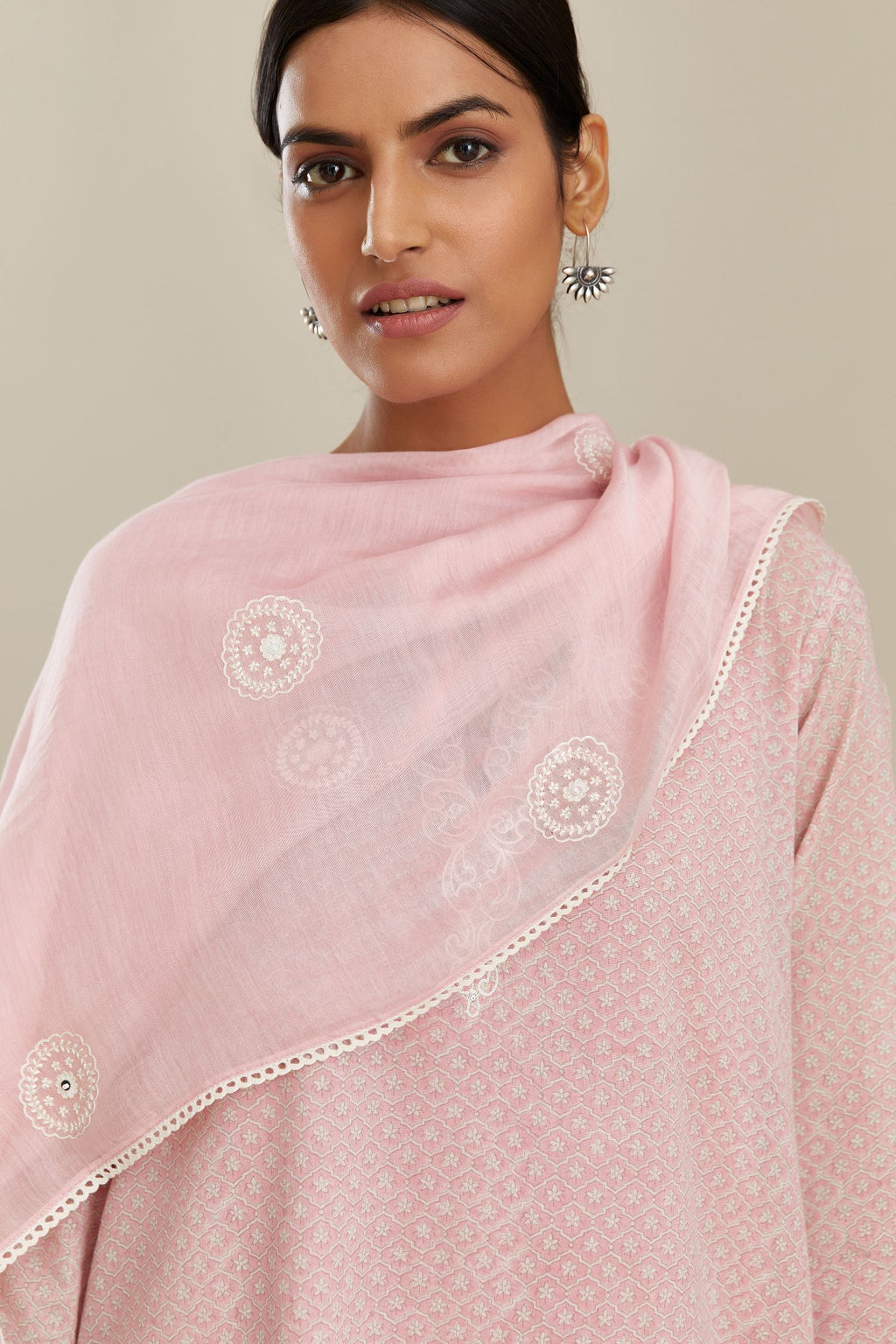 Pink cotton chanderi dupatta with all over round booti embroidery.