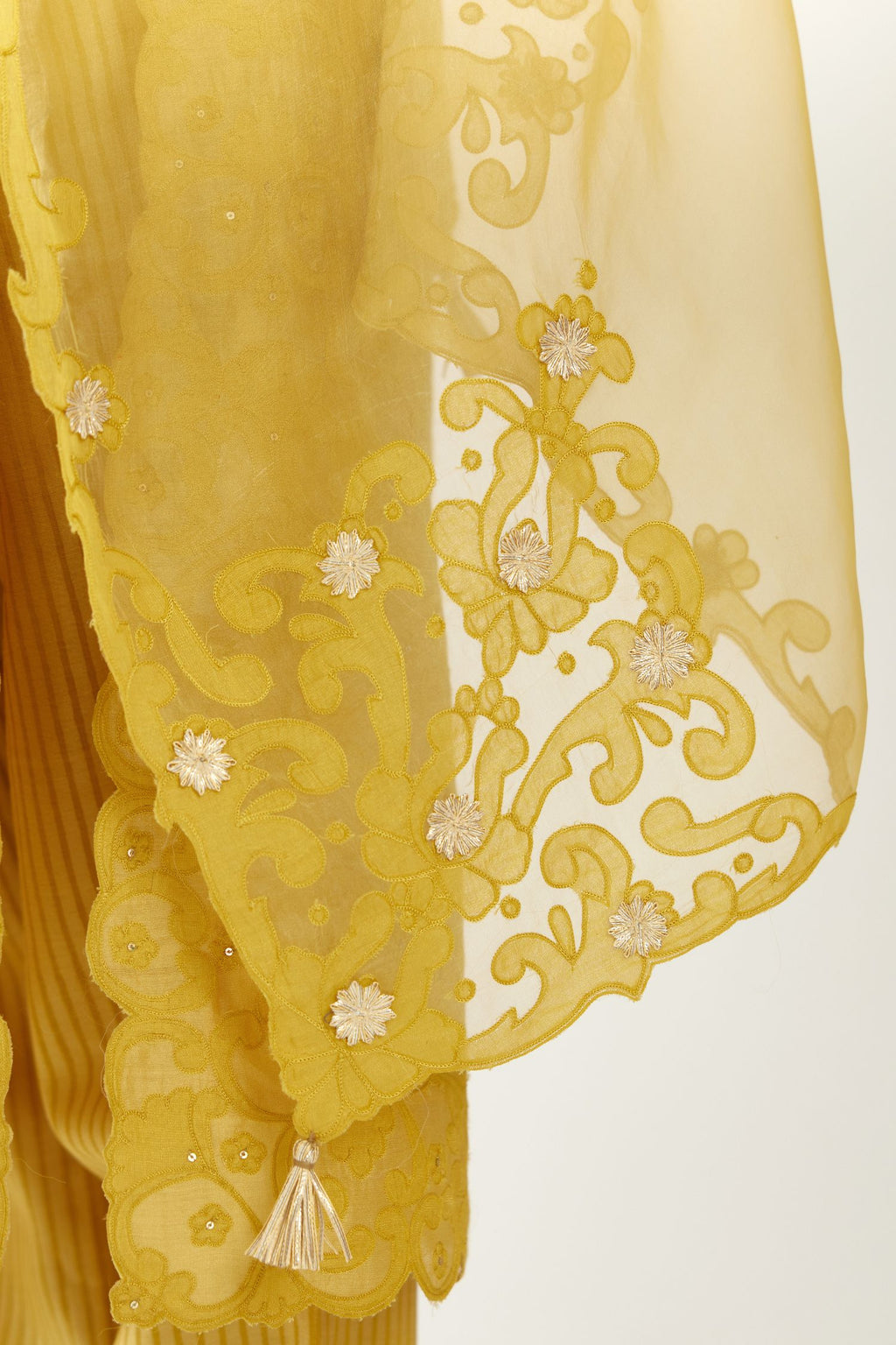 Yellow organza dupatta with heavy silk chanderi appliqué embroidery and gota flower detail.