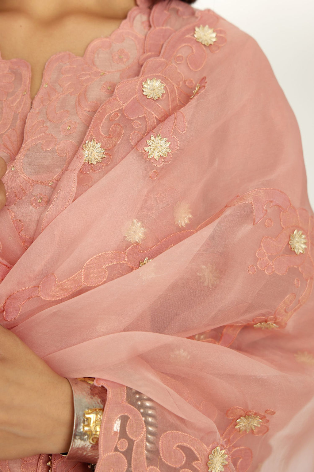 Pink organza dupatta with heavy silk chanderi appliqué embroidery and gota flower detail.