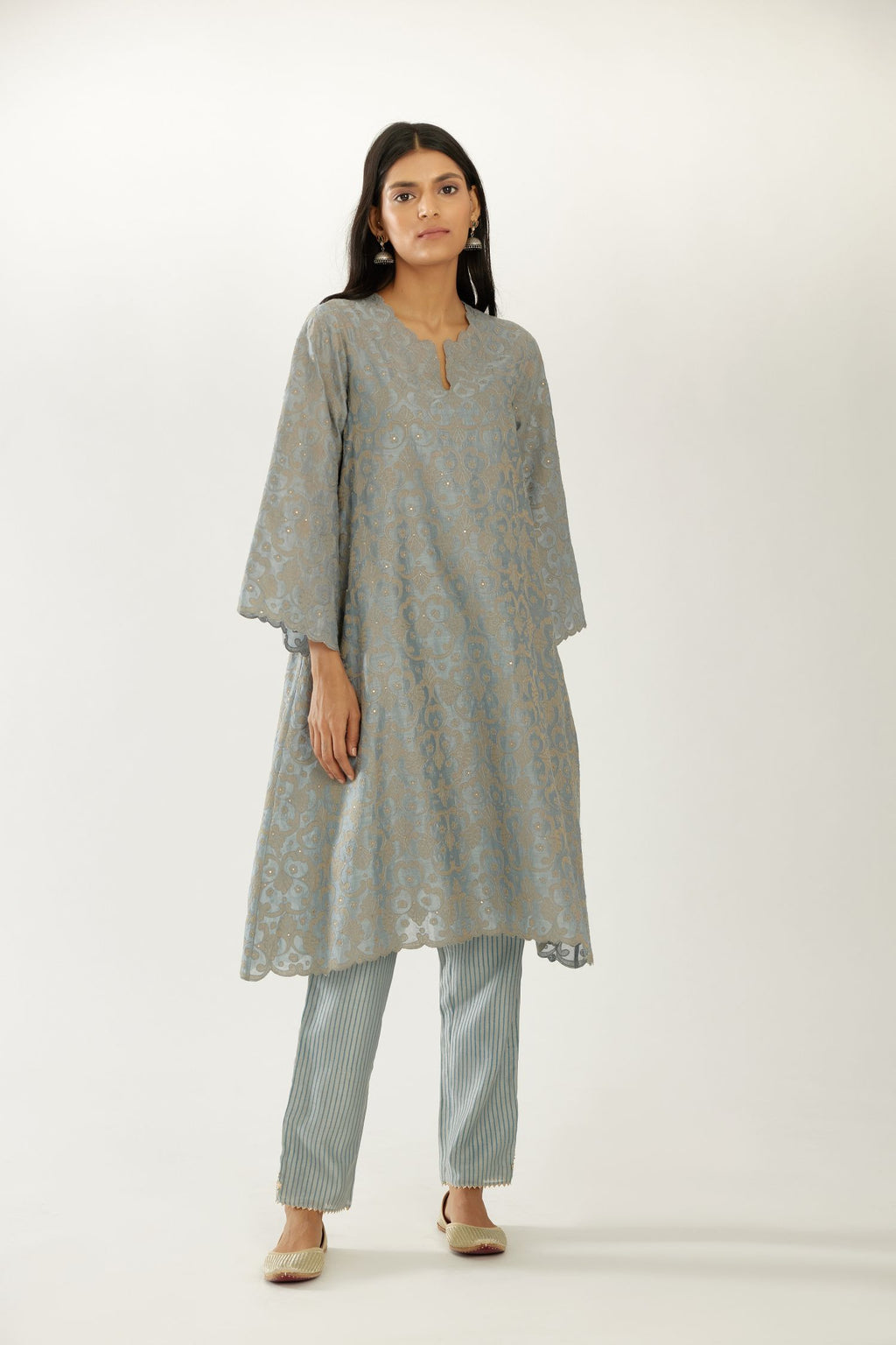 Blue short easy fit kurta set with all-over trellis jaal appliqué, highlighted with sequins.