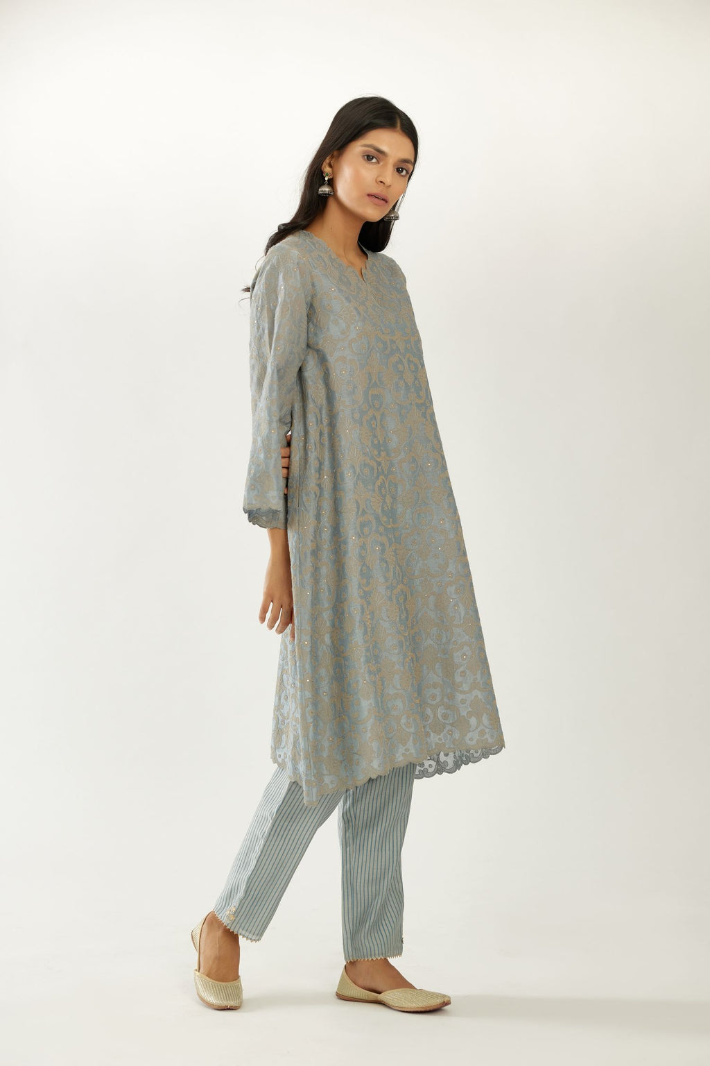 Blue short easy fit kurta set with all-over trellis jaal appliqué, highlighted with sequins.