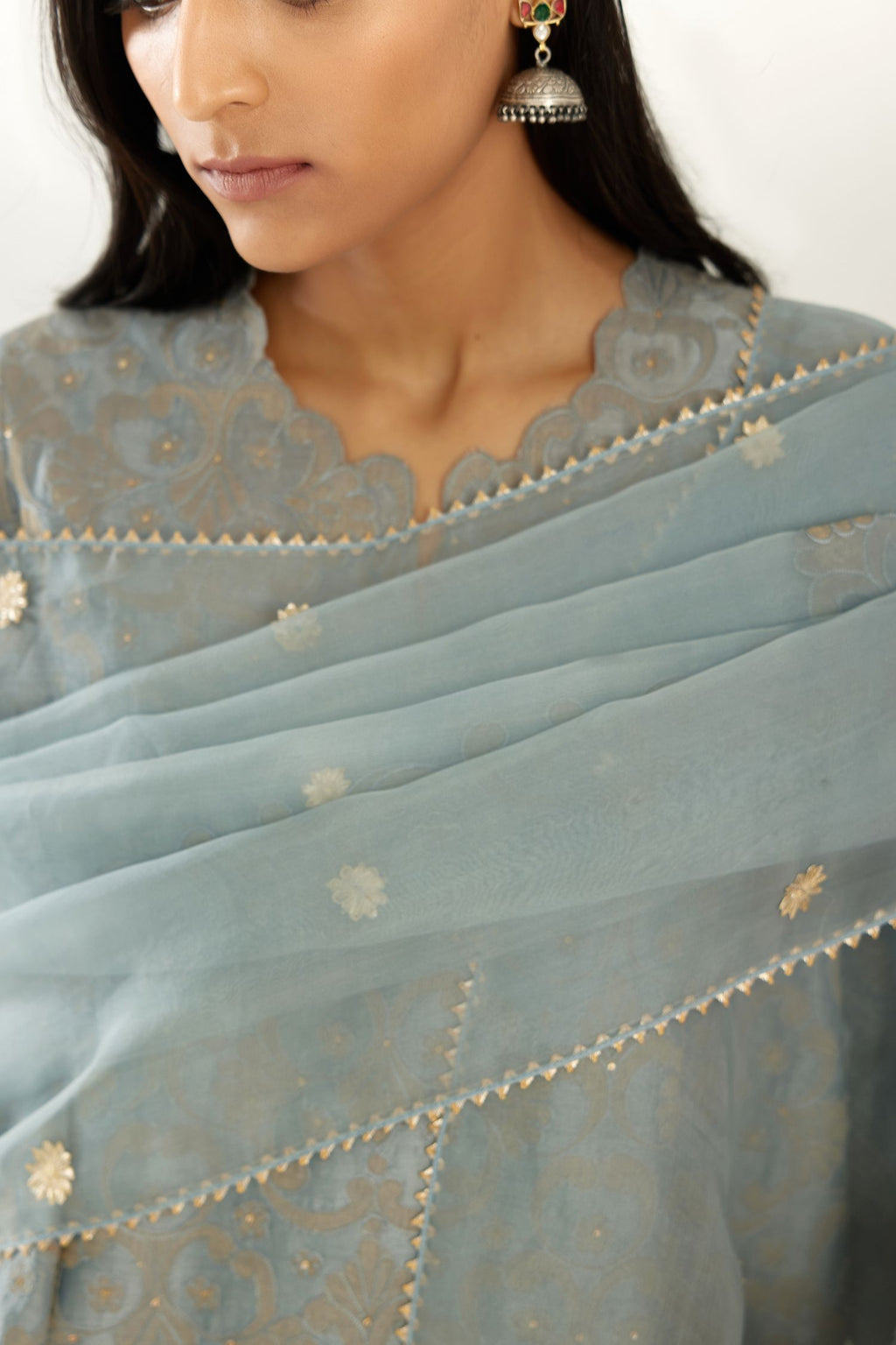 Blue organza dupatta with silk chanderi appliqué embroidery and gota flower detail.