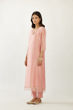 Pink silk chanderi hand block printed straight kurta set, highlighted with organza and gota embroidered flower at edges
