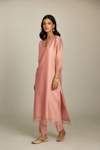 Pink silk chanderi hand block printed straight kurta set, highlighted with organza and gota embroidered flower at edges