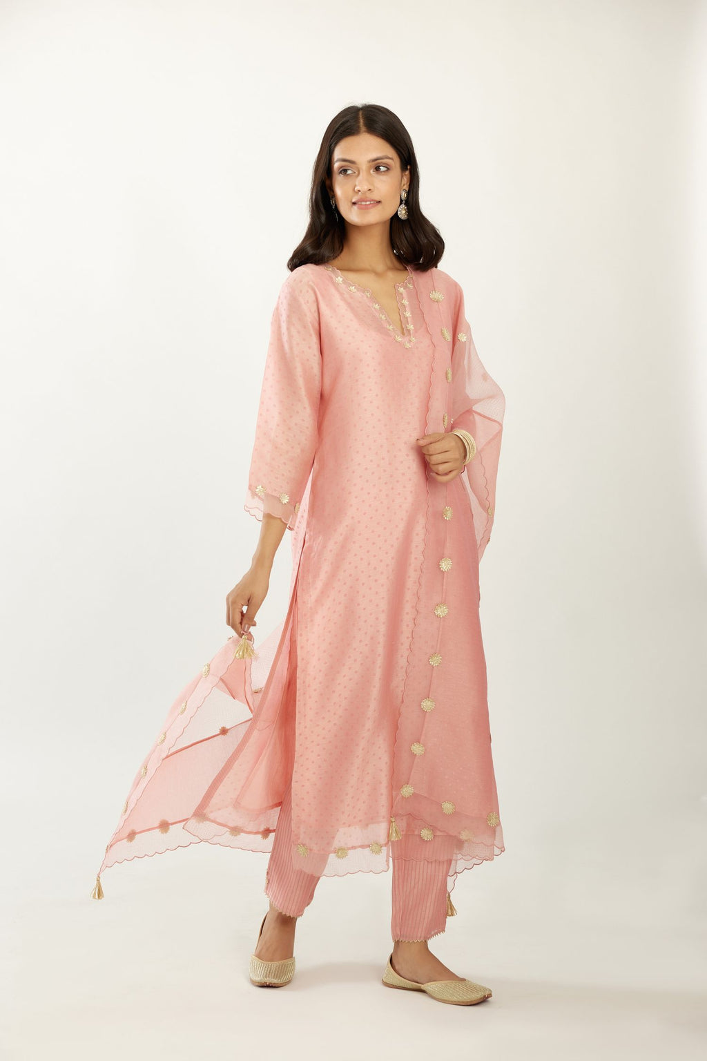 Pink silk chanderi hand block printed straight kurta set, highlighted with organza and gota embroidered flower at edges