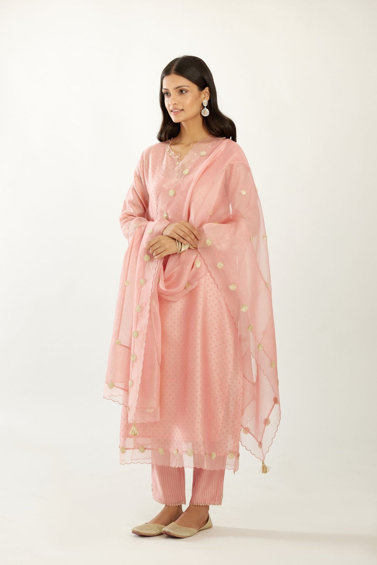 Pink silk chanderi hand block printed straight kurta set, highlighted with organza and gota embroidered flower at edges