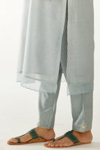 Blue silk chanderi hand block printed straight kurta set, highlighted with scalloped organza at edges.