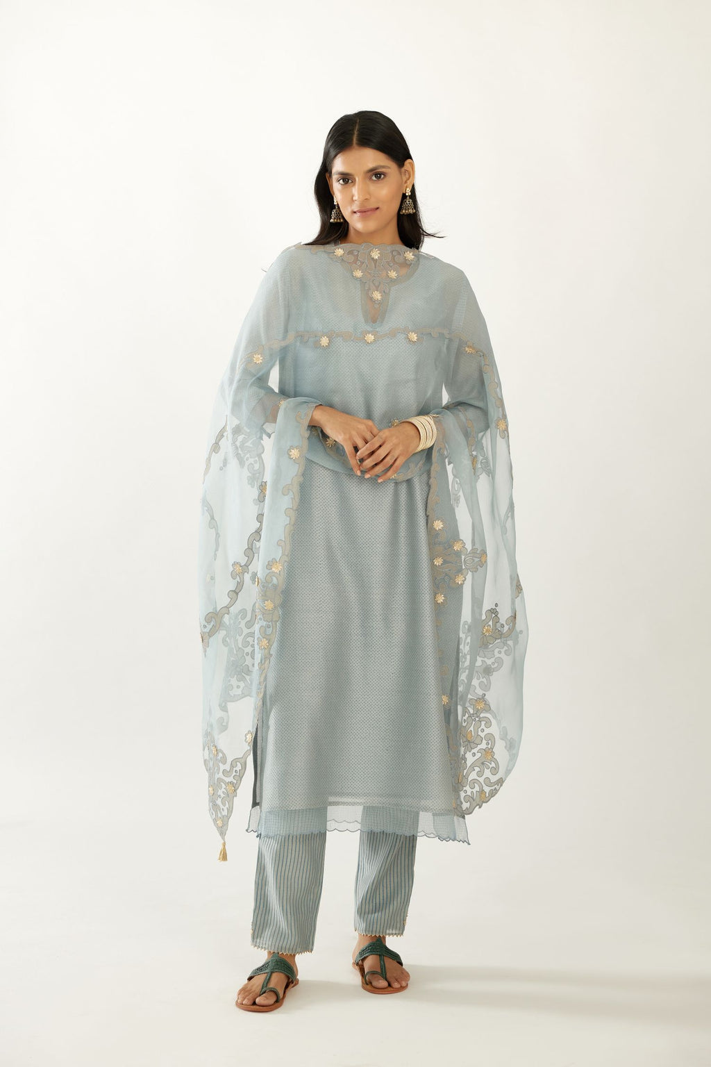 Blue silk chanderi hand block printed straight kurta set, highlighted with scalloped organza at edges.
