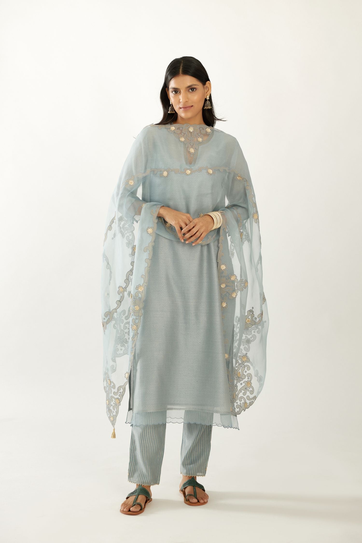 Blue silk chanderi hand block printed straight kurta set, highlighted with scalloped organza at edges.
