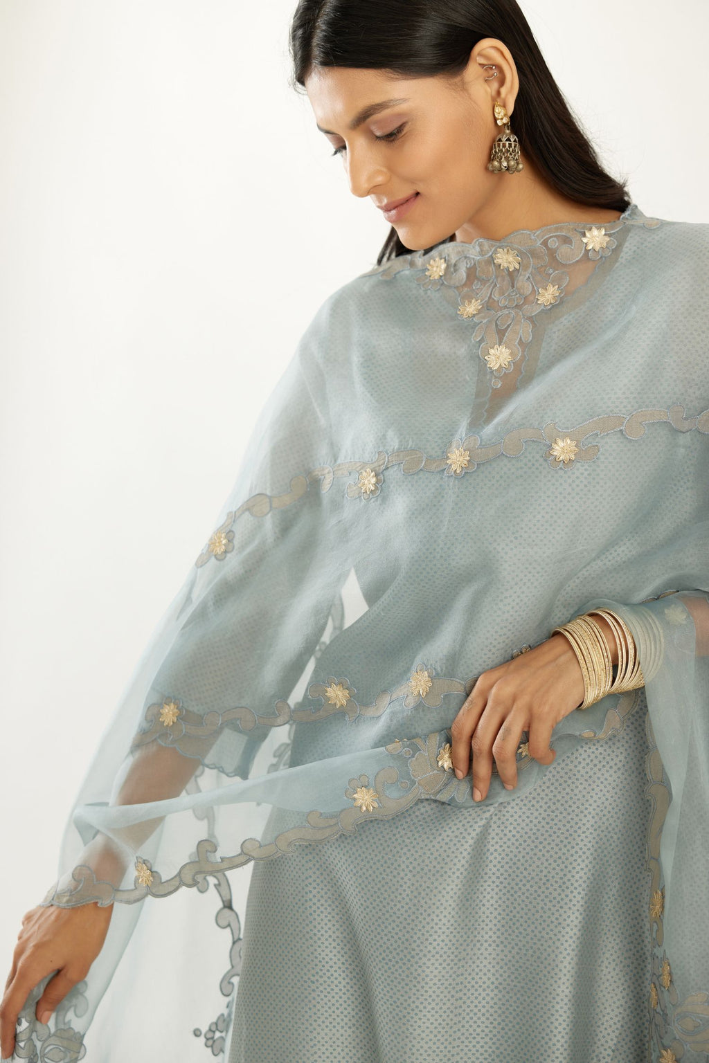 Blue silk chanderi hand block printed straight kurta set, highlighted with scalloped organza at edges.