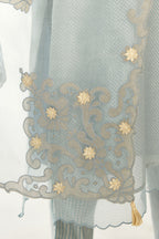 Blue silk chanderi hand block printed straight kurta set, highlighted with scalloped organza at edges.