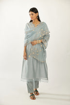 Blue silk chanderi hand block printed straight kurta set, highlighted with scalloped organza at edges.