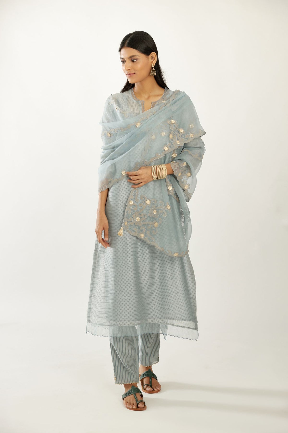 Blue silk chanderi hand block printed straight kurta set, highlighted with scalloped organza at edges.