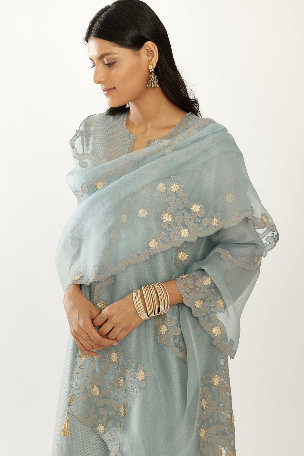 Blue silk chanderi hand block printed straight kurta set, highlighted with scalloped organza at edges.
