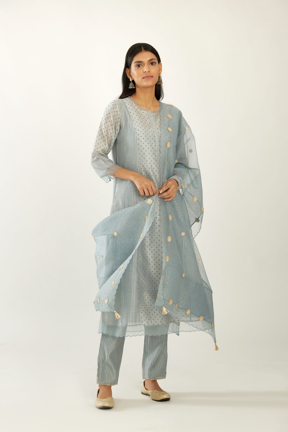 Blue hand block printed narrow dupatta, highlighted with all-over gota flower and organza scalloped edges.