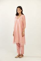 Pink A-line hand block printed silk chanderi short kurta set, highlighted with gota flower embroidery.