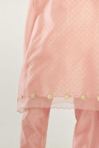 Pink A-line hand block printed silk chanderi short kurta set, highlighted with gota flower embroidery.