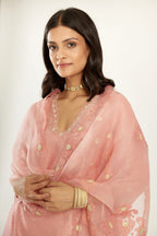 Pink A-line hand block printed silk chanderi short kurta set, highlighted with gota flower embroidery.