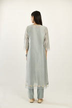 Blue silk chanderi hand block printed straight kurta set, highlighted with organza and gota embroidered flower at edges