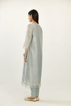 Blue silk chanderi hand block printed straight kurta set, highlighted with organza and gota embroidered flower at edges