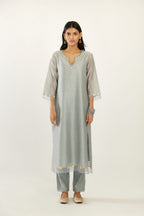 Blue silk chanderi hand block printed straight kurta set, highlighted with organza and gota embroidered flower at edges