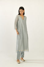 Blue silk chanderi hand block printed straight kurta set, highlighted with organza and gota embroidered flower at edges