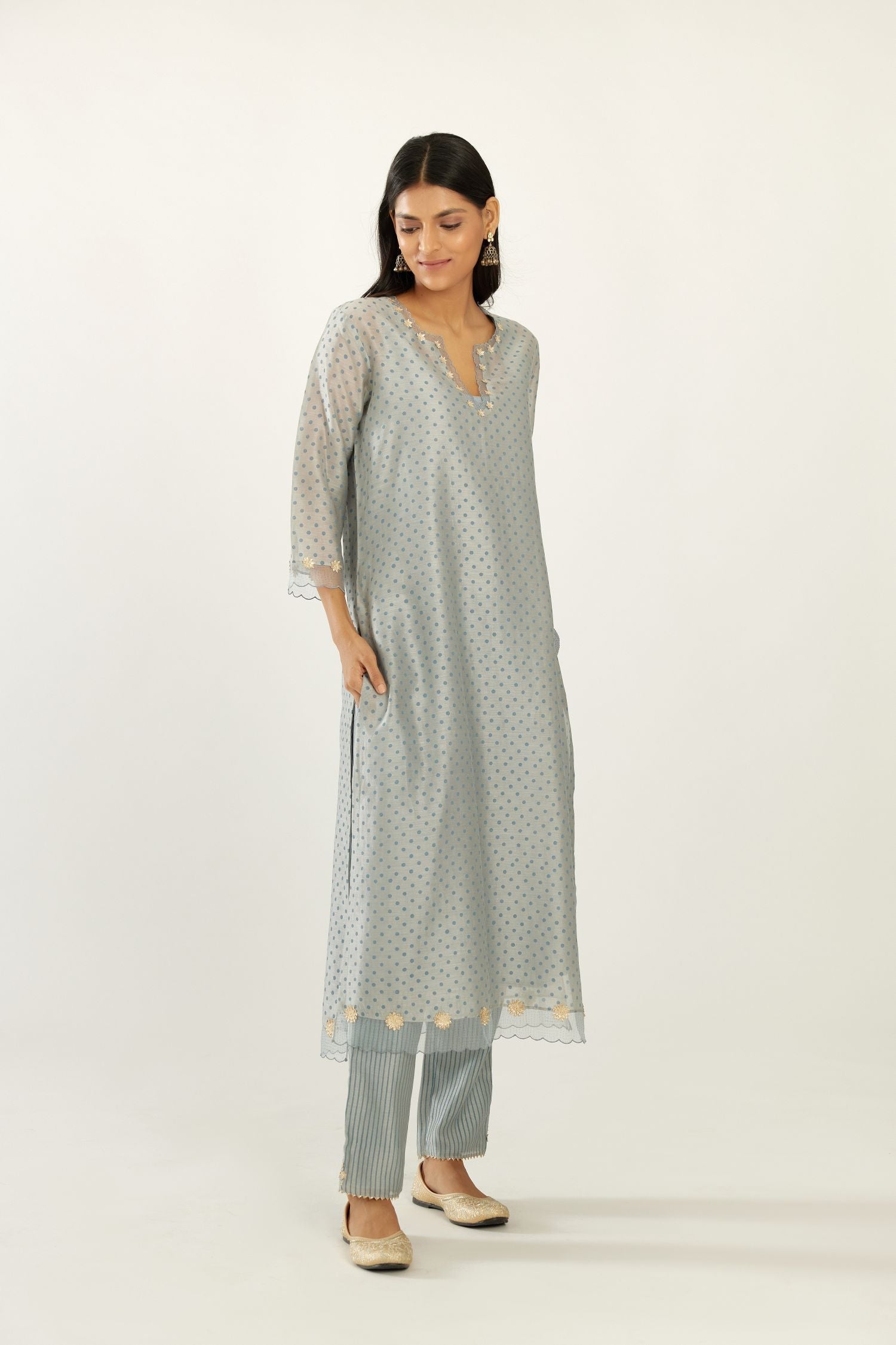 Blue silk chanderi hand block printed straight kurta set, highlighted with organza and gota embroidered flower at edges