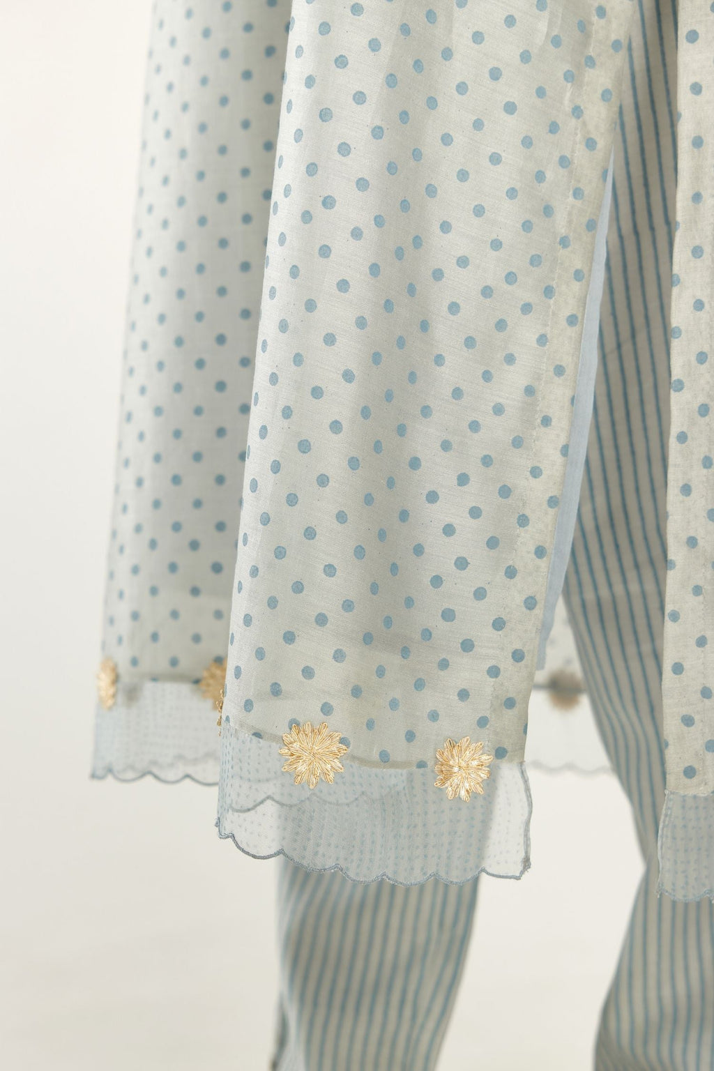 Blue silk chanderi hand block printed straight kurta set, highlighted with organza and gota embroidered flower at edges