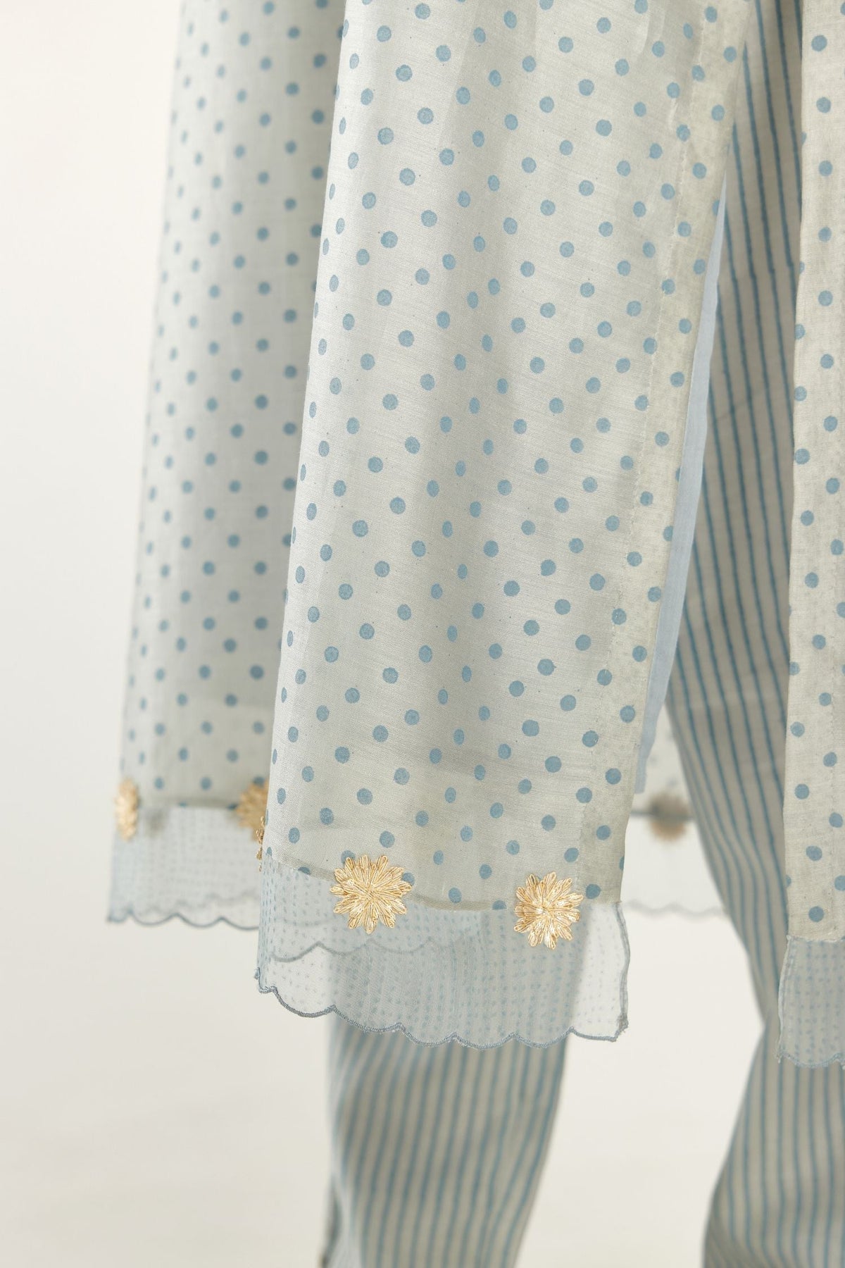 Blue silk chanderi hand block printed straight kurta set, highlighted with organza and gota embroidered flower at edges
