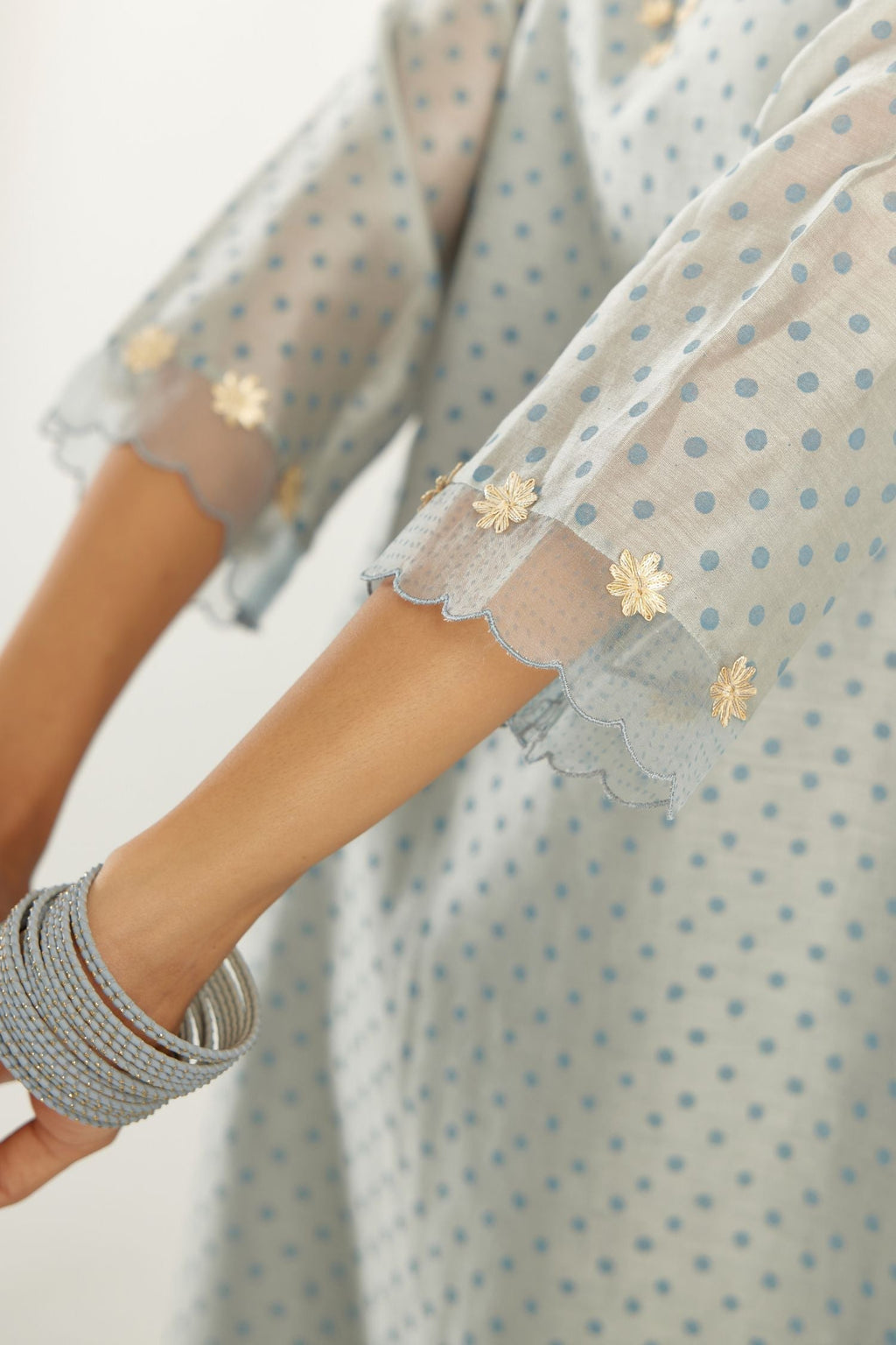 Blue silk chanderi hand block printed straight kurta set, highlighted with organza and gota embroidered flower at edges