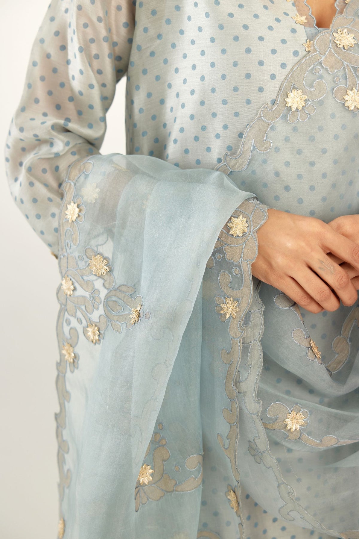 Blue silk chanderi hand block printed straight kurta set, highlighted with organza and gota embroidered flower at edges