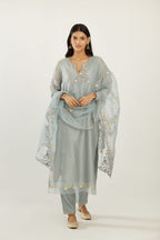 Blue silk chanderi hand block printed straight kurta set, highlighted with organza and gota embroidered flower at edges