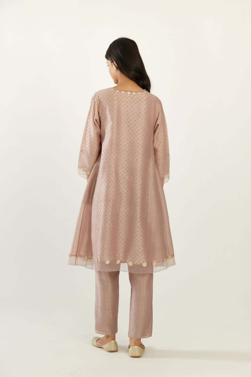 Lilac hand block printed silk chanderi easy fit short kurta set, highlighted with gota flower and scalloped organza at edges.