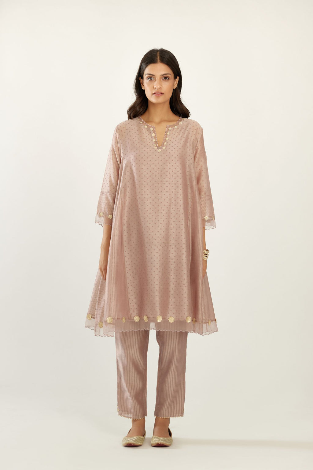 Lilac hand block printed silk chanderi easy fit short kurta set, highlighted with gota flower and scalloped organza at edges.