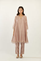Lilac hand block printed silk chanderi easy fit short kurta set, highlighted with gota flower and scalloped organza at edges.