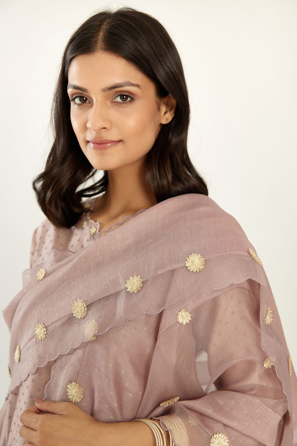 Lilac hand block printed silk chanderi easy fit short kurta set, highlighted with gota flower and scalloped organza at edges.