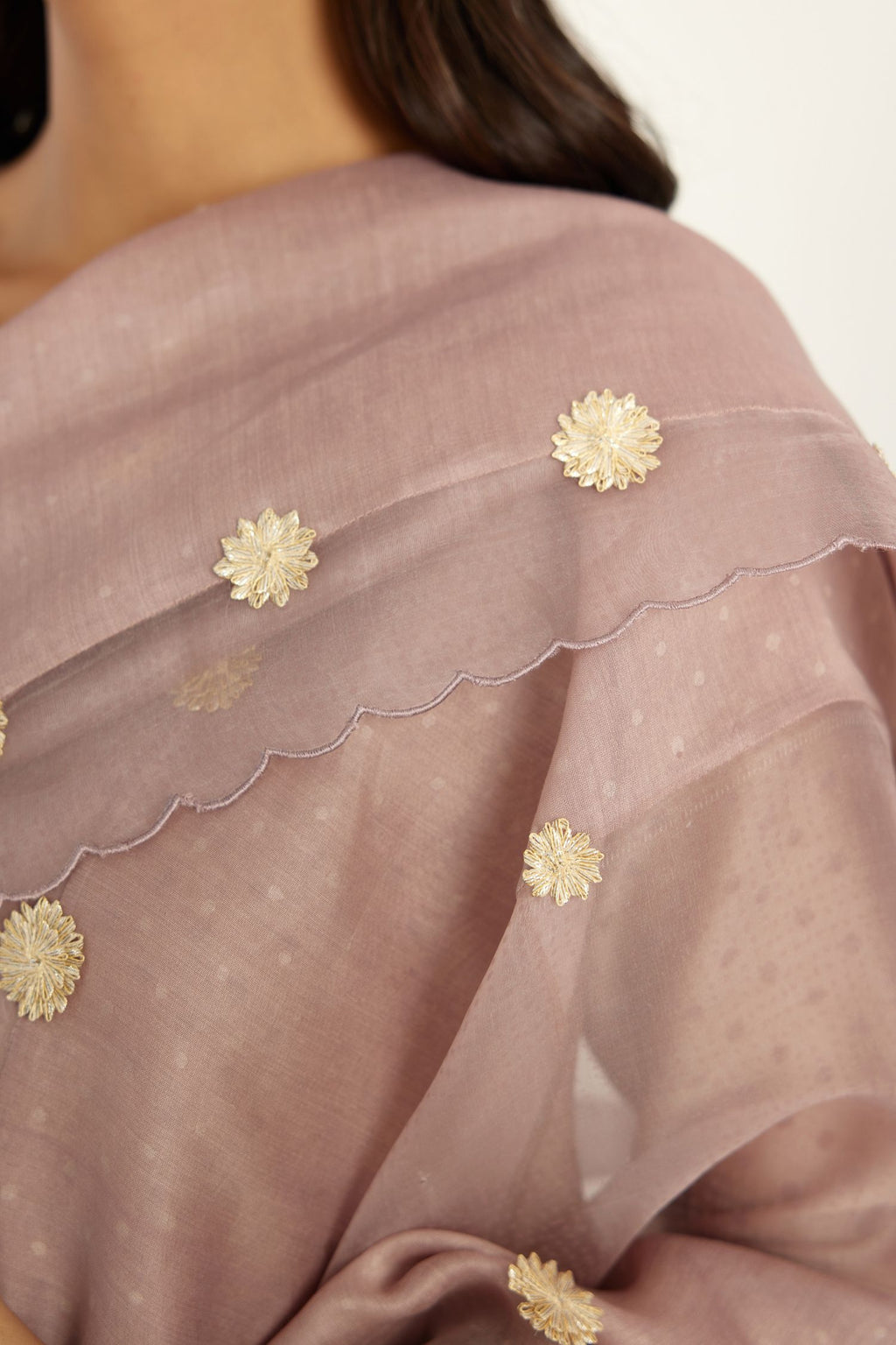 Lilac hand block printed narrow dupatta, highlighted with all-over gota flower and organza scalloped edges.
