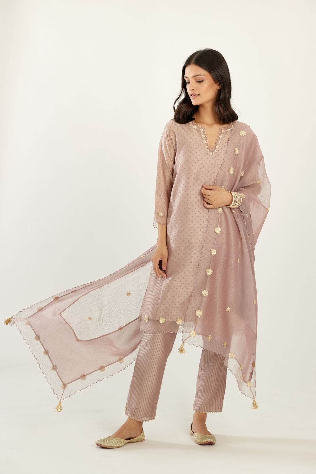Lilac hand block printed silk chanderi easy fit short kurta set, highlighted with gota flower and scalloped organza at edges.