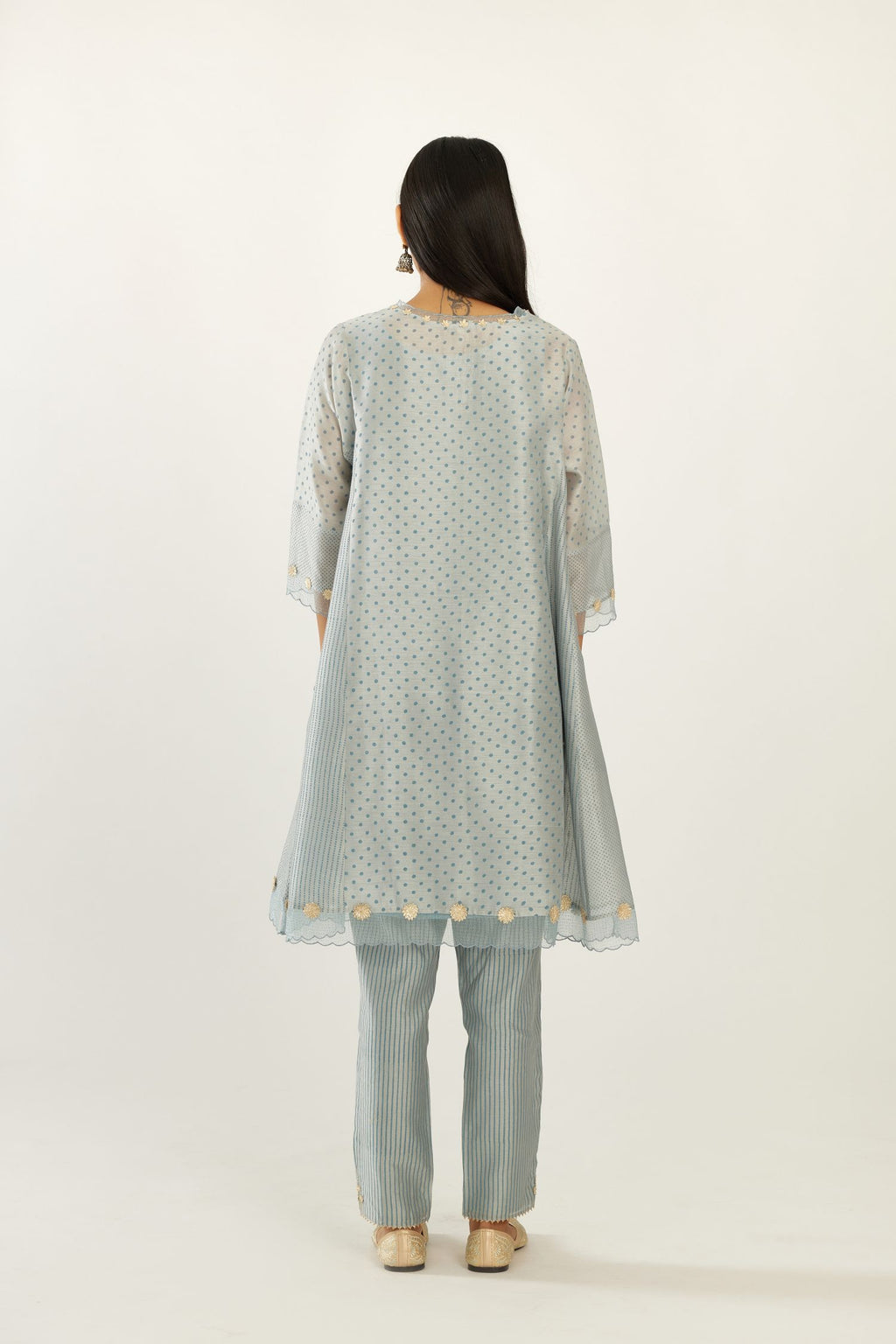 Blue hand block printed silk chanderi easy fit short kurta set, highlighted with gota flower and scalloped organza at edges.