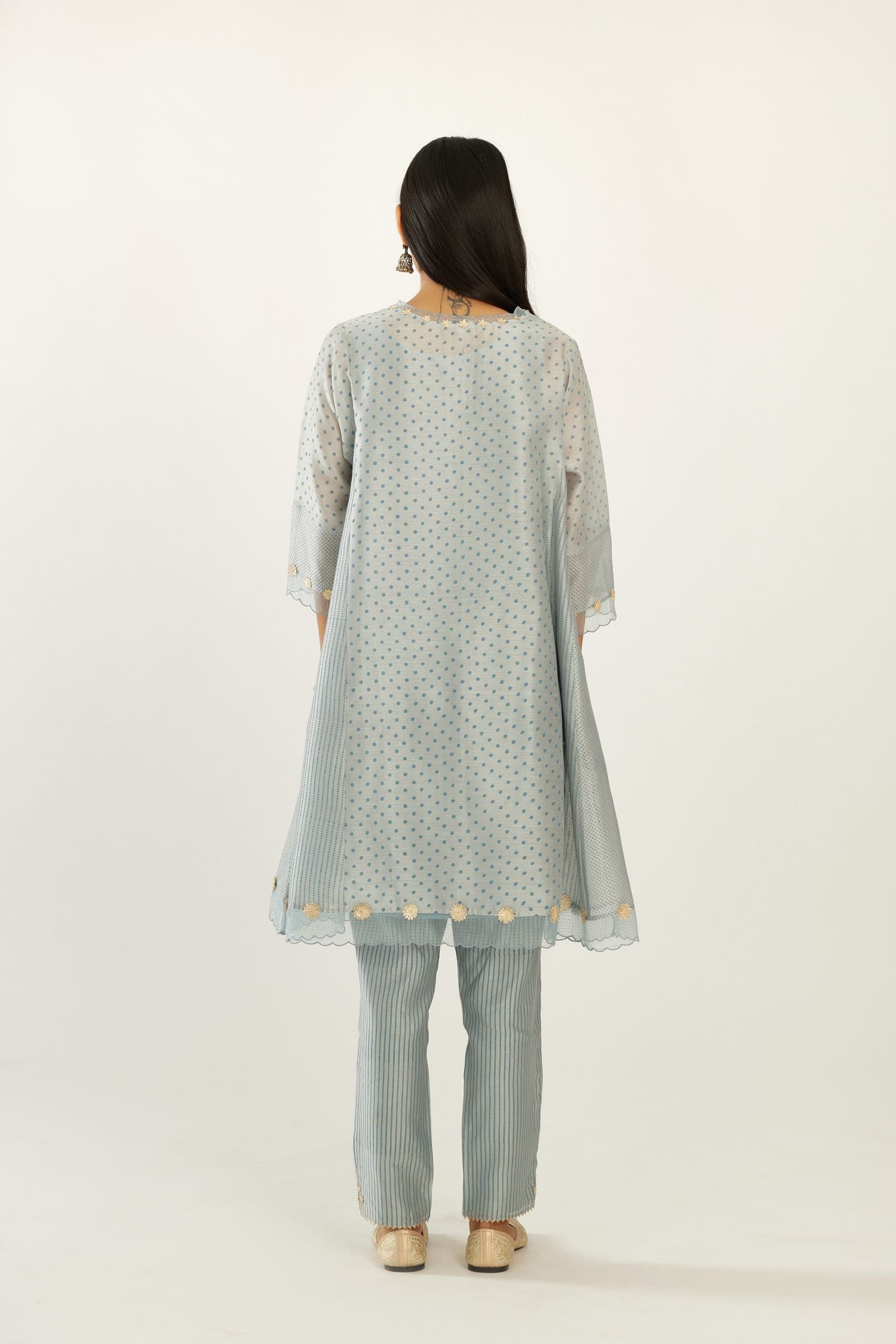 Blue hand block printed silk chanderi easy fit short kurta set, highlighted with gota flower and scalloped organza at edges.