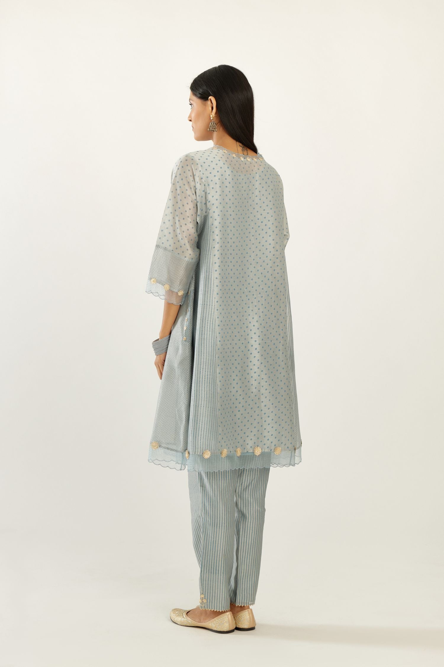 Blue hand block printed silk chanderi easy fit short kurta set, highlighted with gota flower and scalloped organza at edges.
