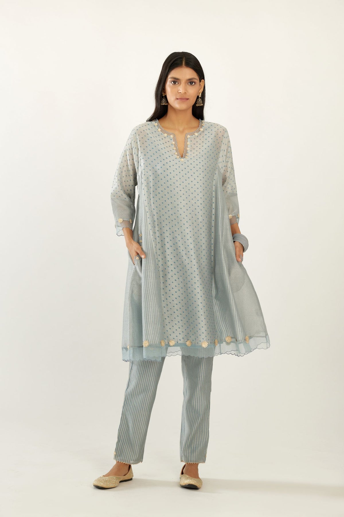 Blue hand block printed silk chanderi easy fit short kurta set, highlighted with gota flower and scalloped organza at edges.