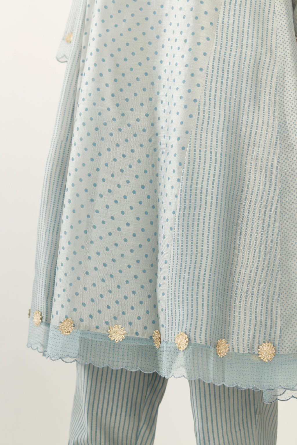 Blue hand block printed silk chanderi easy fit short kurta set, highlighted with gota flower and scalloped organza at edges.
