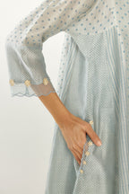 Blue hand block printed silk chanderi easy fit short kurta set, highlighted with gota flower and scalloped organza at edges.