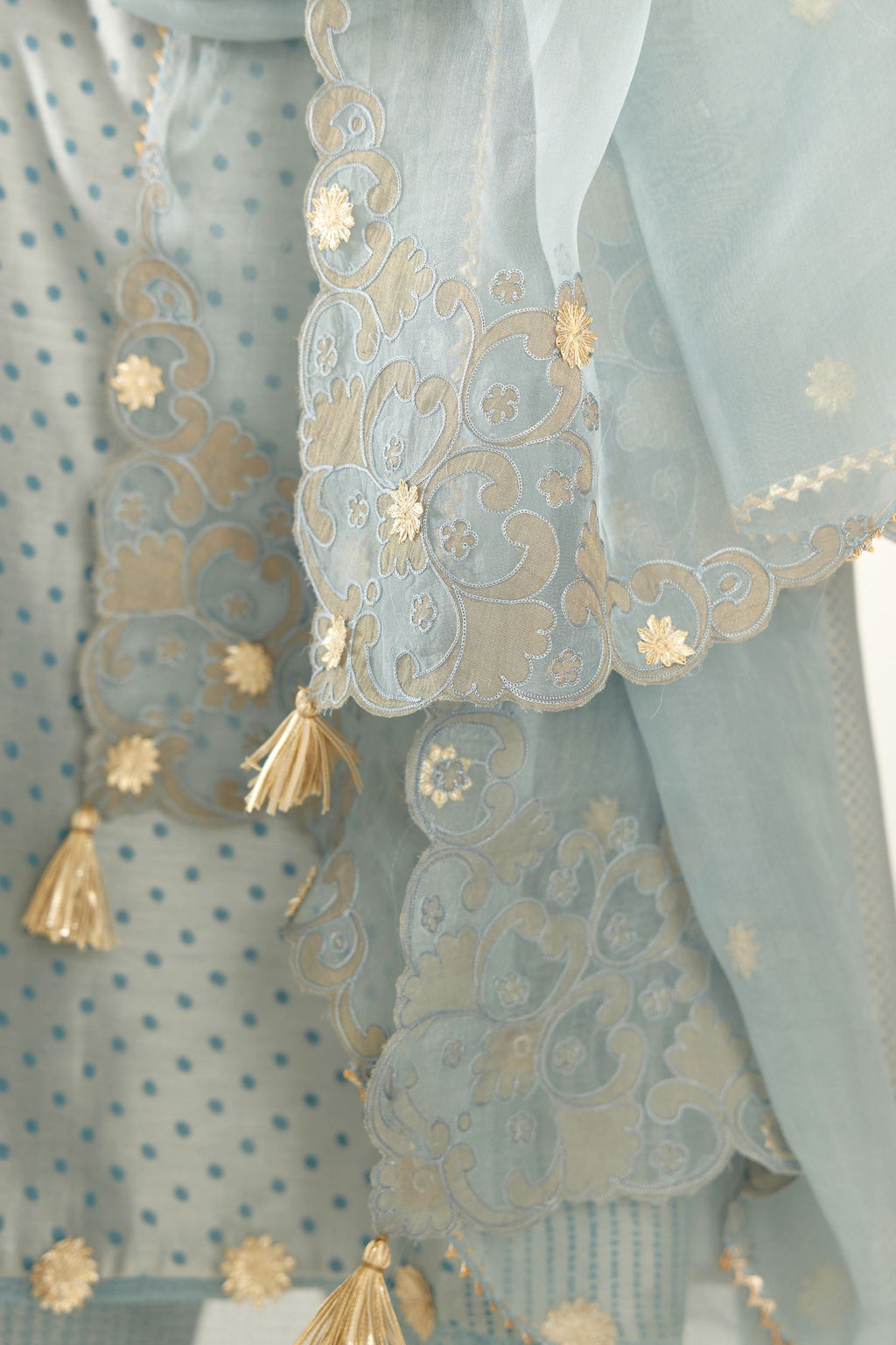 Blue hand block printed silk chanderi easy fit short kurta set, highlighted with gota flower and scalloped organza at edges.
